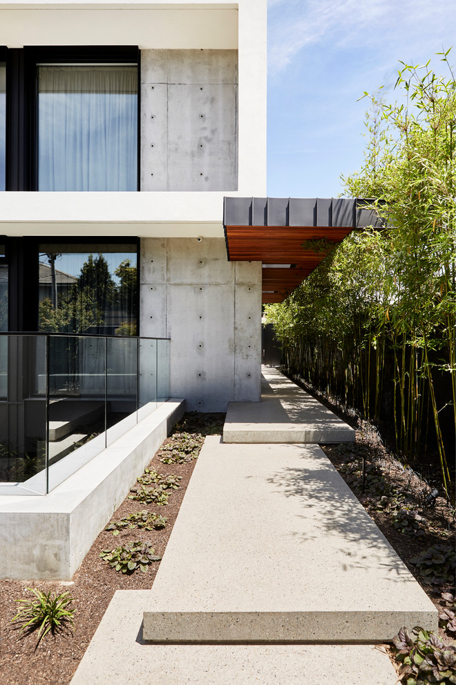 Example of a minimalist exterior home design in Melbourne