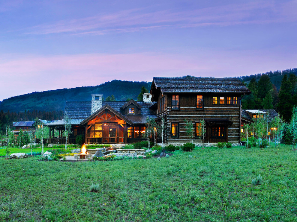 Example of a mountain style two-story exterior home design in Denver