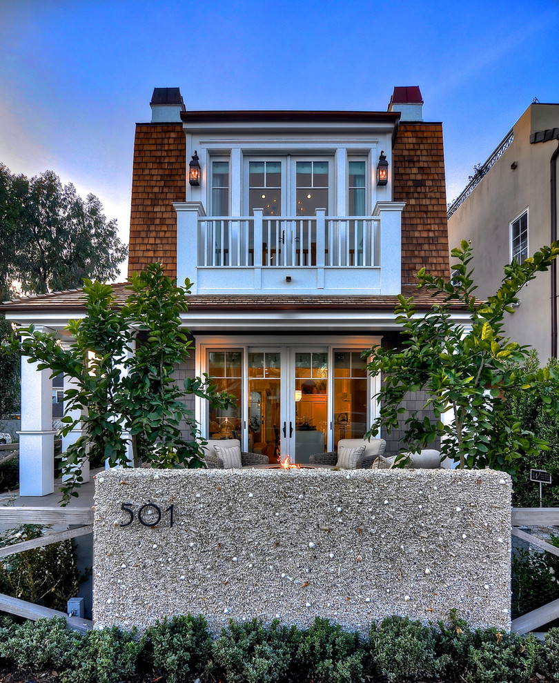 Photo of a small classic two floor house exterior in Orange County.
