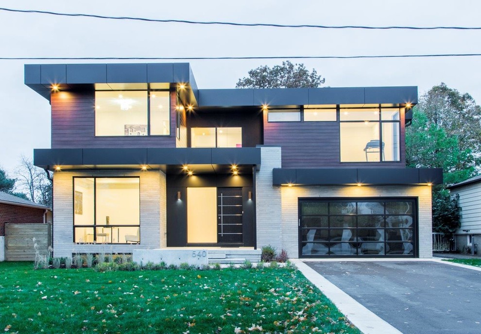 Источник вдохновения для домашнего уюта: большой, двухэтажный, стеклянный частный загородный дом в стиле модернизм с плоской крышей
