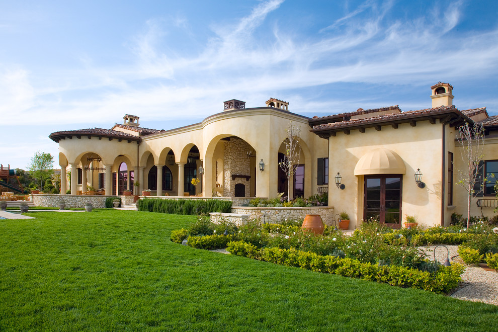 Design ideas for a mediterranean house exterior in Los Angeles.