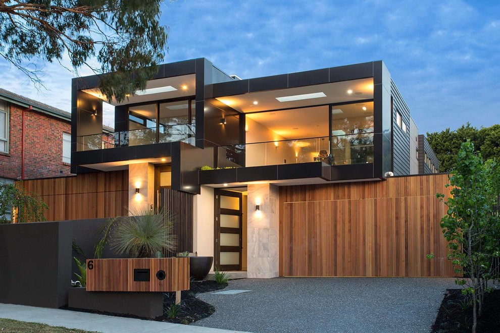 Zweistöckiges Modernes Haus mit Mix-Fassade, schwarzer Fassadenfarbe und Flachdach in Melbourne