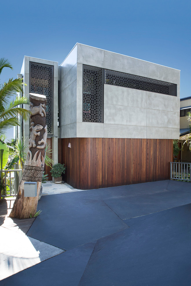 Contemporary house exterior in Gold Coast - Tweed with three floors and concrete fibreboard cladding.