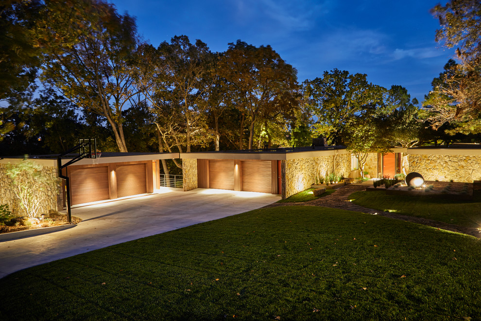 Inspiration for a mid-sized 1960s beige one-story mixed siding flat roof remodel in Other