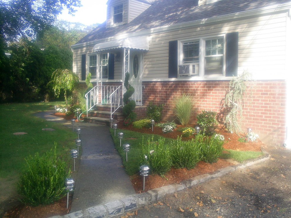 8 Traditional Exterior Newark by MC GREENFIELD LANDSCAPING LLC