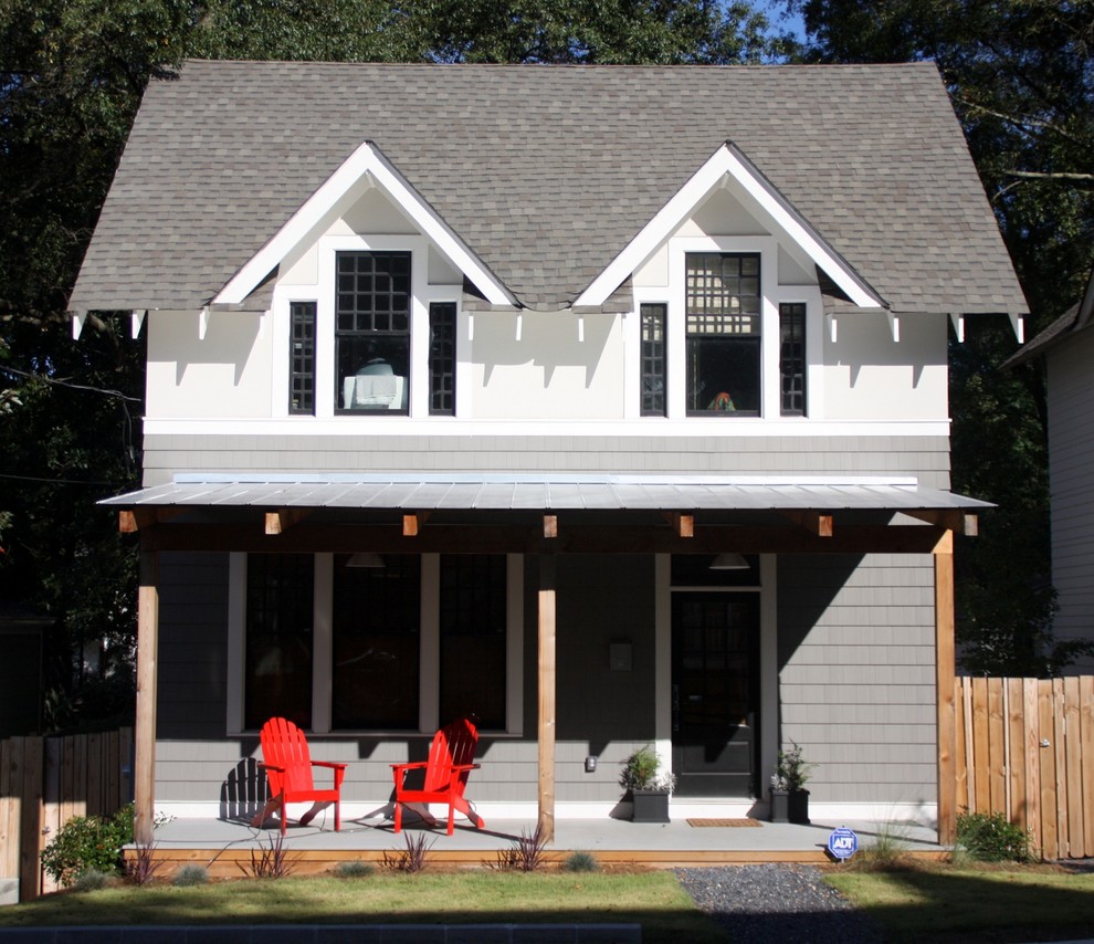 Small classic two floor house exterior in Atlanta with a pitched roof.