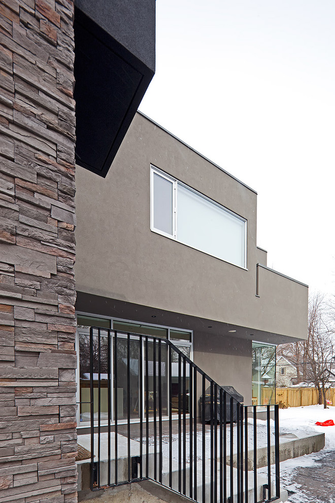Design ideas for a modern house exterior in Toronto.