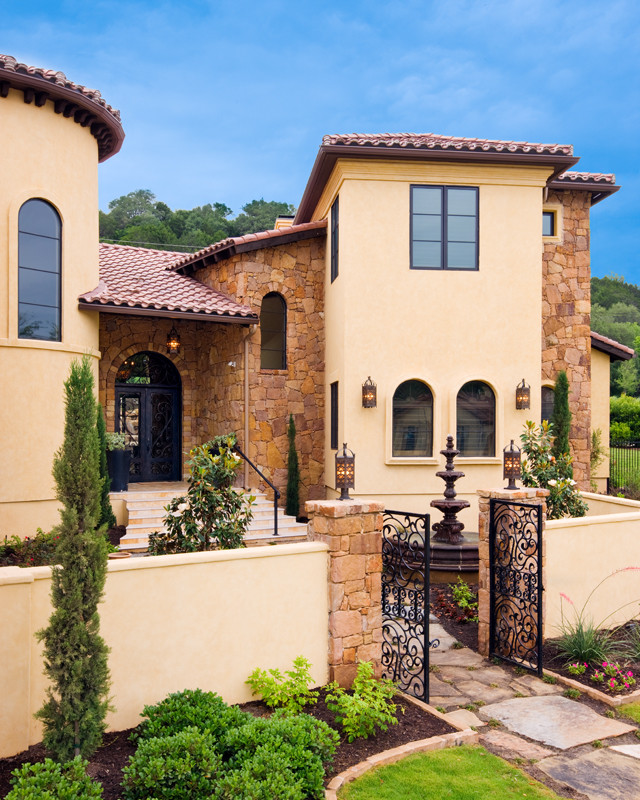 Inspiration for a mediterranean exterior home remodel in Austin