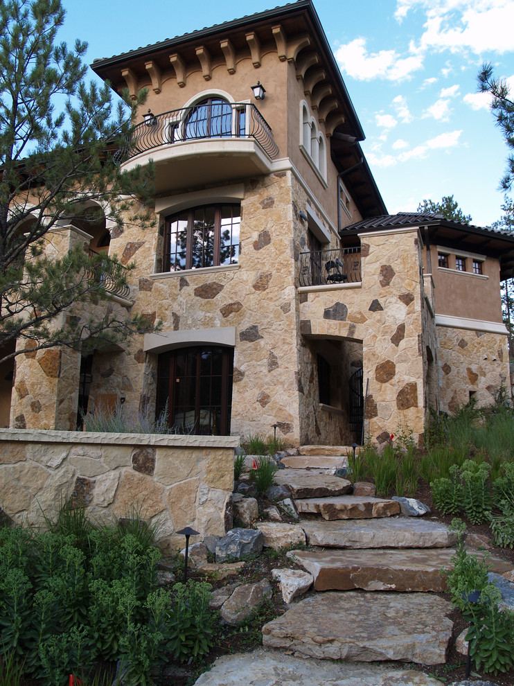 Mediterranean house exterior in Denver with mixed cladding.