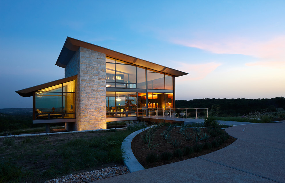 A Glass House in the Hill Country Contemporary Exterior Charlotte by Home Design & Decor
