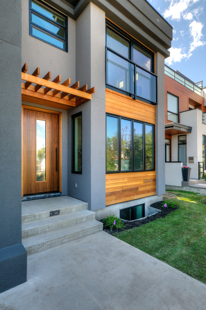 This is an example of a contemporary house exterior in Calgary.