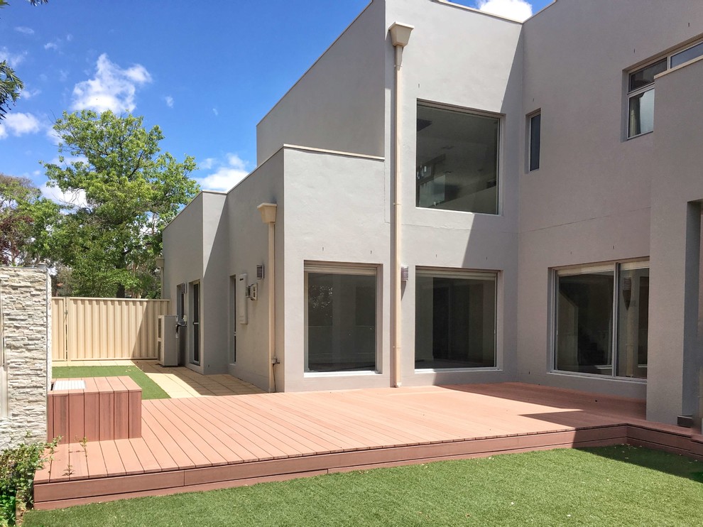 Modernes Einfamilienhaus mit Steinfassade, grauer Fassadenfarbe, Flachdach und Blechdach in Canberra - Queanbeyan