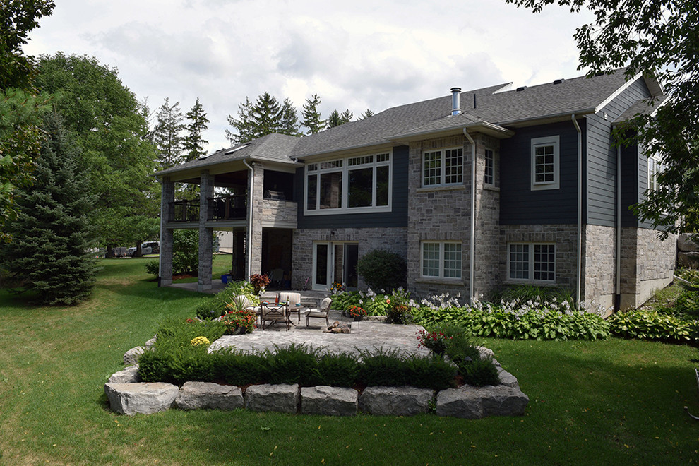 Large transitional exterior home photo in Toronto
