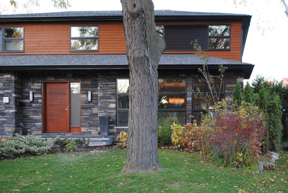 Design ideas for a traditional house exterior in Toronto.