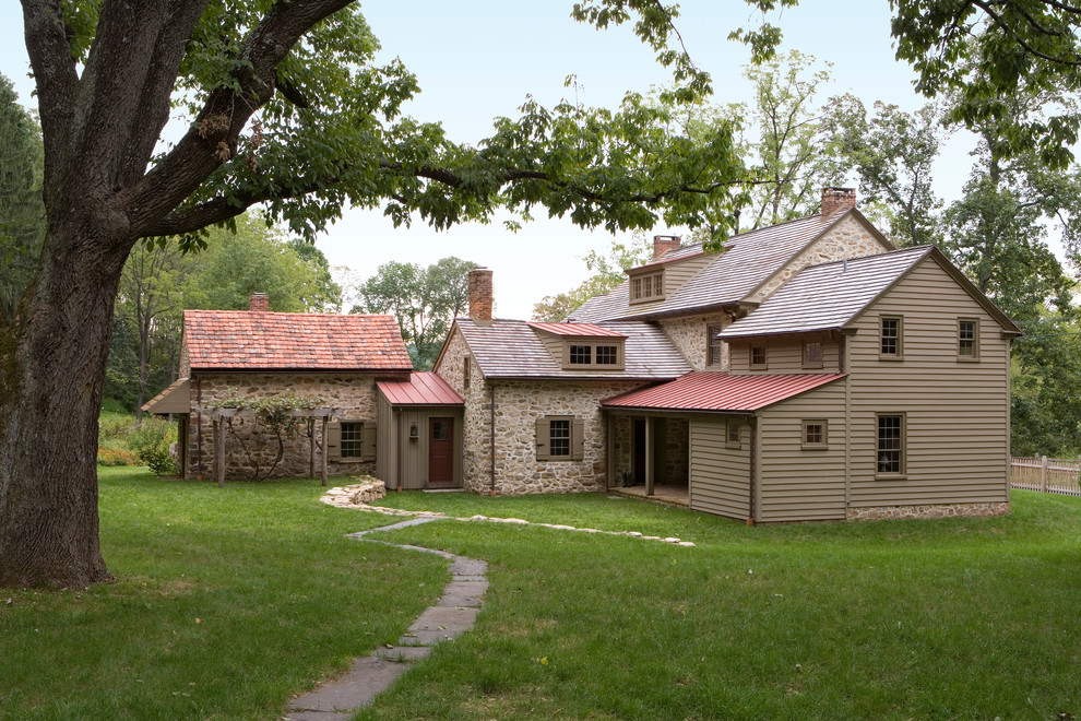 Inspiration for a medium sized and brown farmhouse two floor house exterior in Philadelphia with mixed cladding and a mixed material roof.