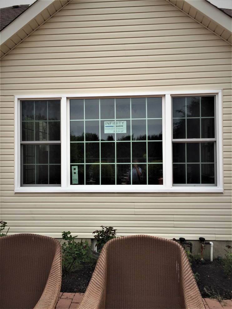 Adobe Cream Siding and Marvin Infinity Windows Installed in Manalapan