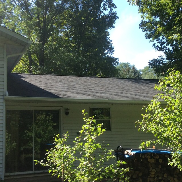 After Landmark Moire Black Blown In Insulation Complete Vented Soffit