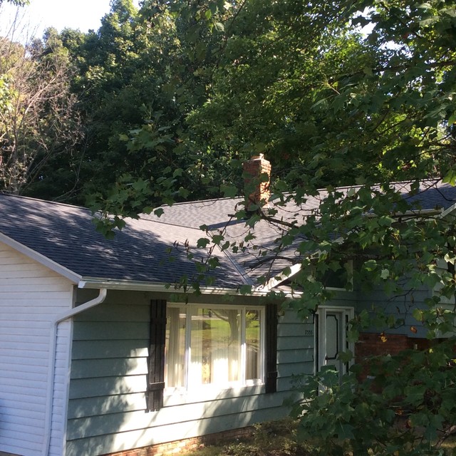 After Landmark Moire Black Blown In Insulation Complete Vented Soffit