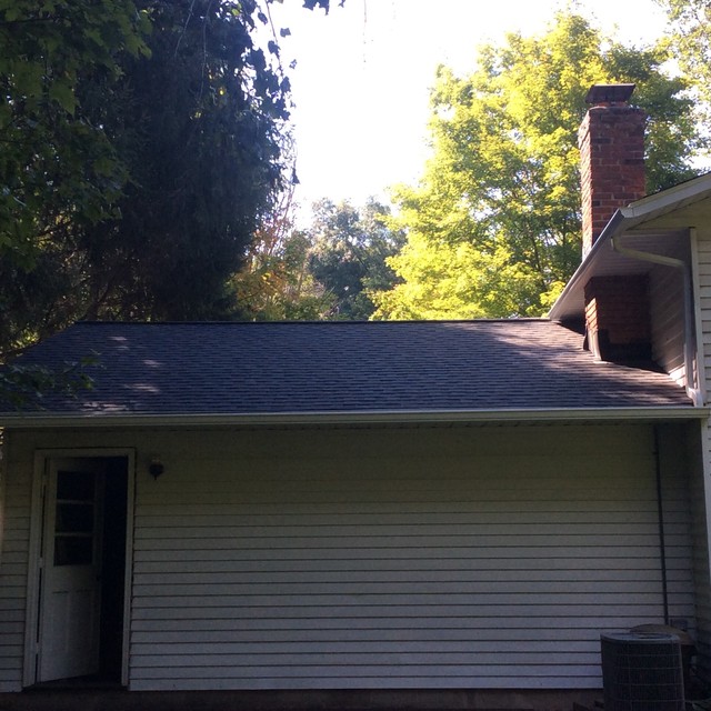After Landmark Moire Black Blown In Insulation Complete Vented Soffit