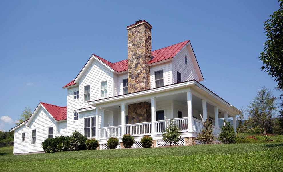 Example of a mid-sized country white two-story wood exterior home design in Richmond