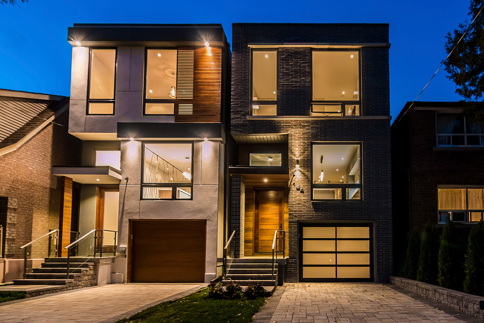 Kleines Modernes Haus mit Putzfassade und Flachdach in Toronto