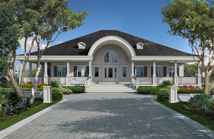 Foto della facciata di una casa bianca stile marinaro di medie dimensioni con rivestimento in legno