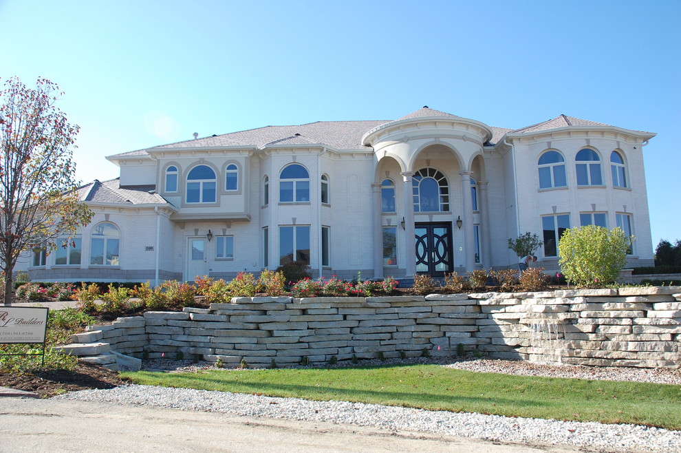 Example of a tuscan exterior home design in Chicago