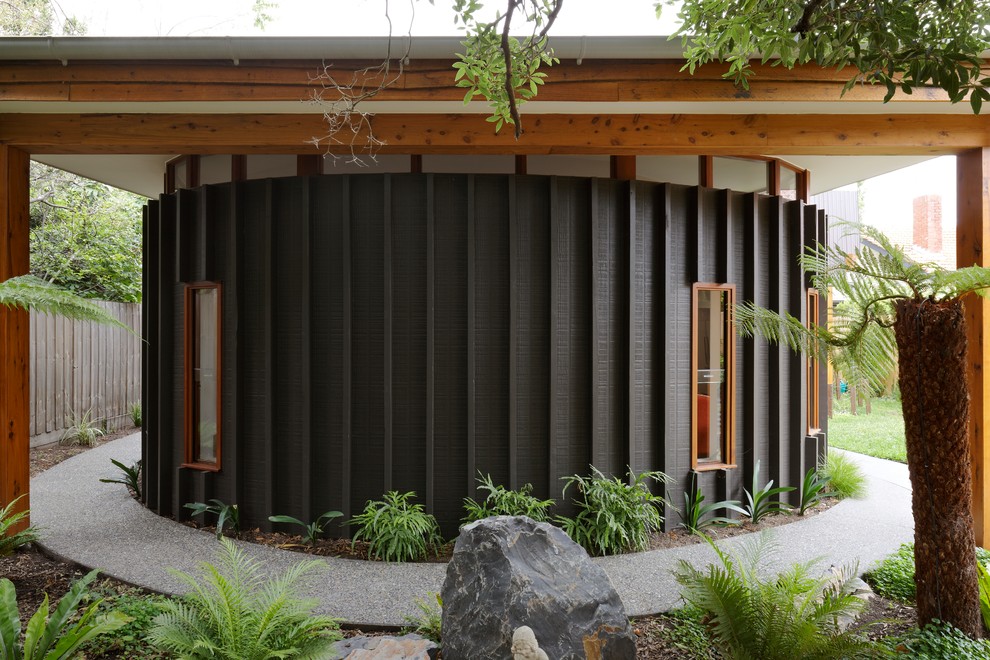 Mid-sized contemporary black exterior home idea in Melbourne