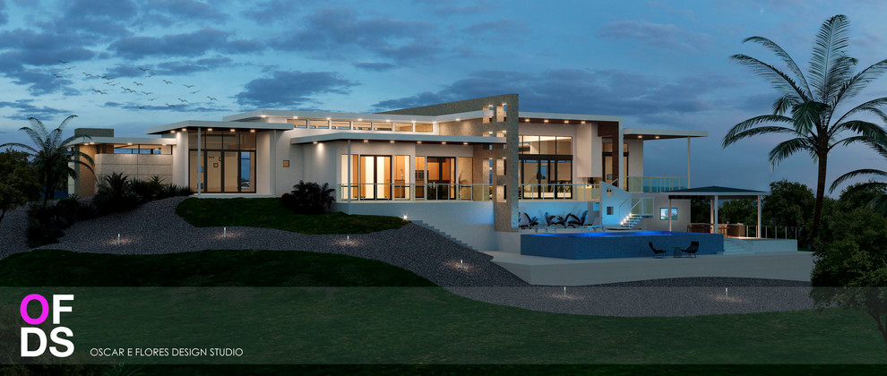 Стильный дизайн: большой, белый дом в стиле модернизм с разными уровнями, облицовкой из цементной штукатурки и плоской крышей - последний тренд