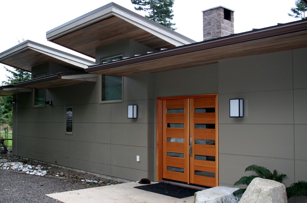 シアトルにあるコンテンポラリースタイルのおしゃれな平屋 (コンクリート繊維板サイディング) の写真