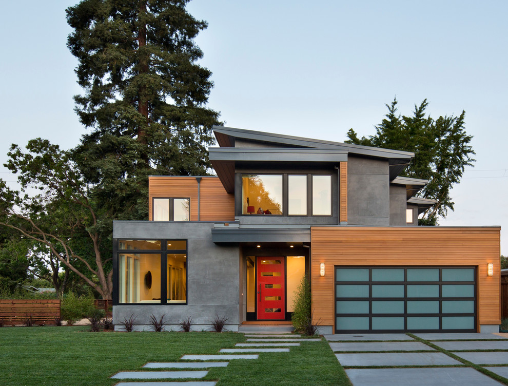 Contemporary two-story mixed siding exterior home idea in San Francisco with a shed roof