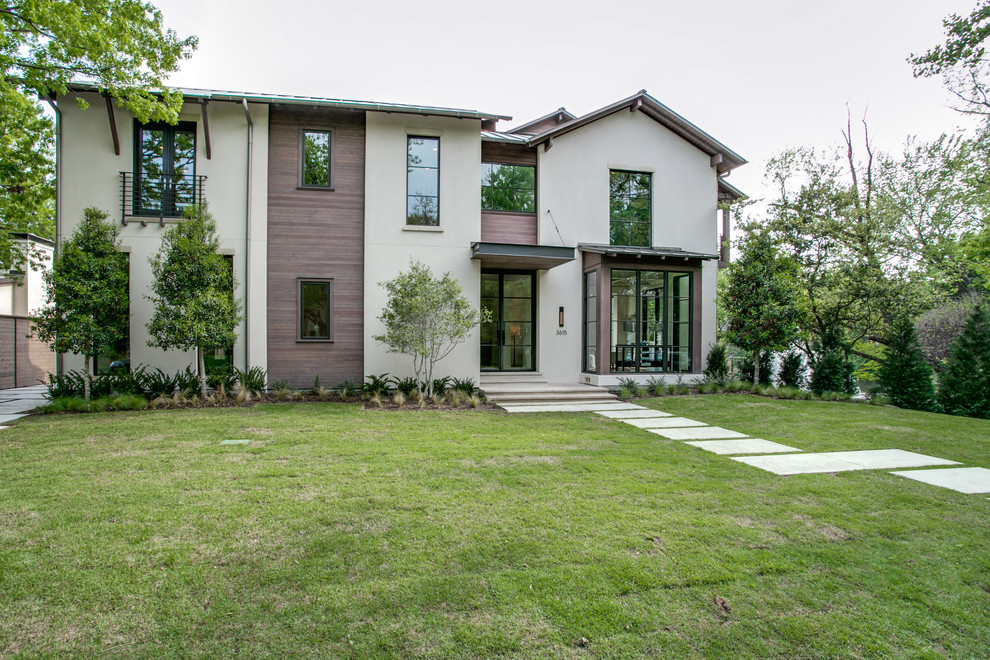 Inspiration for a transitional exterior home remodel in Dallas