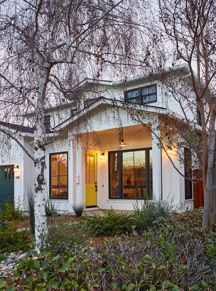 Large country white two-story wood house exterior idea in San Francisco with a shingle roof