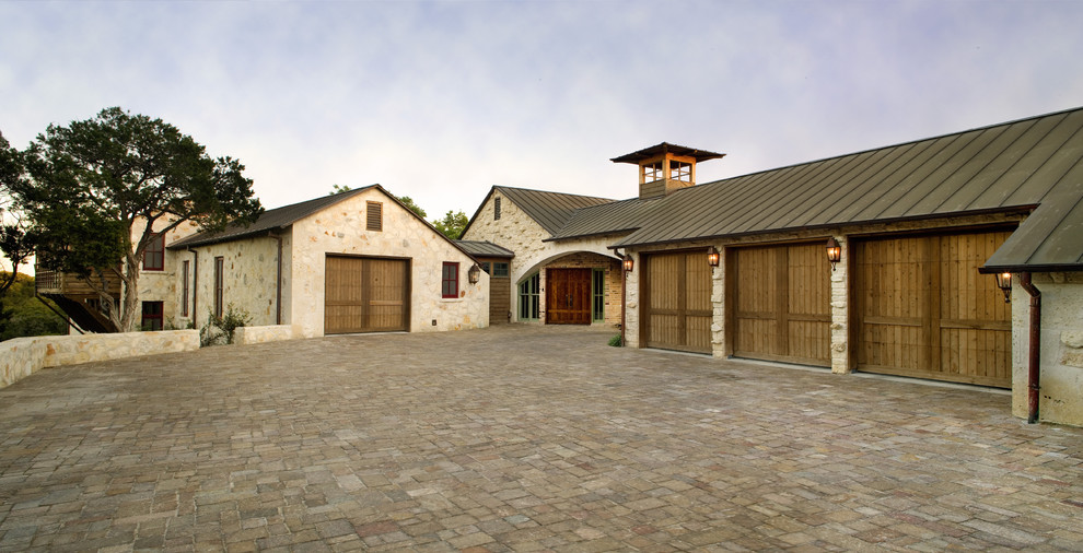 Rustic house exterior in Austin with stone cladding.