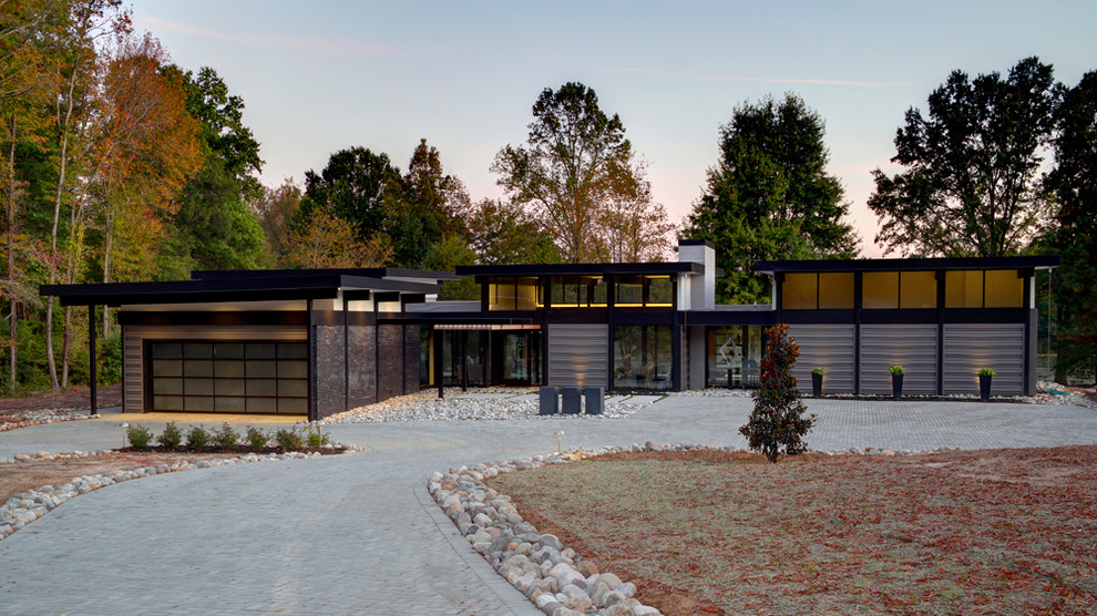 Large modern gray one-story mixed siding exterior home idea in Richmond