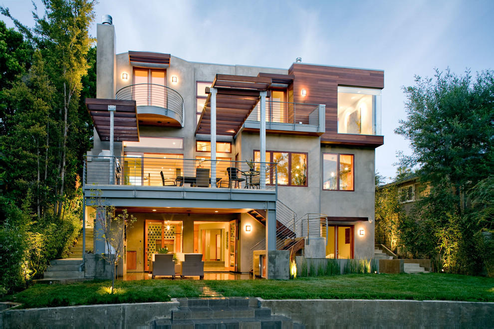 Réalisation d'une grande façade de maison multicolore minimaliste en béton à deux étages et plus avec un toit plat.