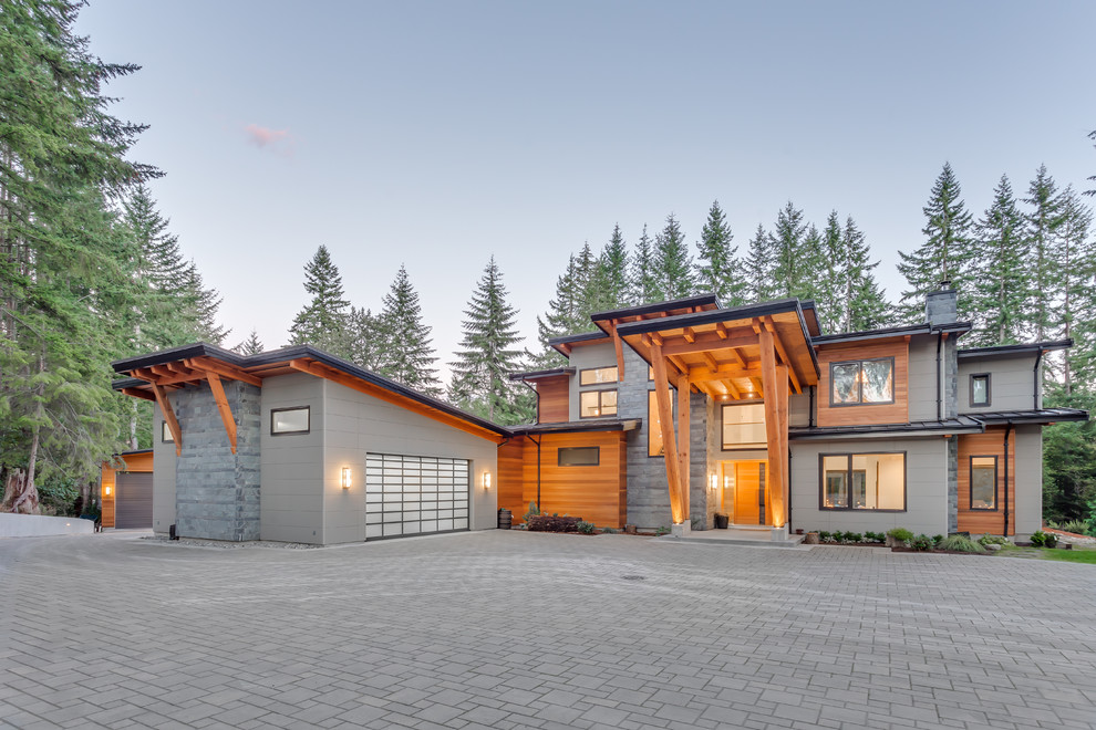Design ideas for a modern house exterior in Vancouver.