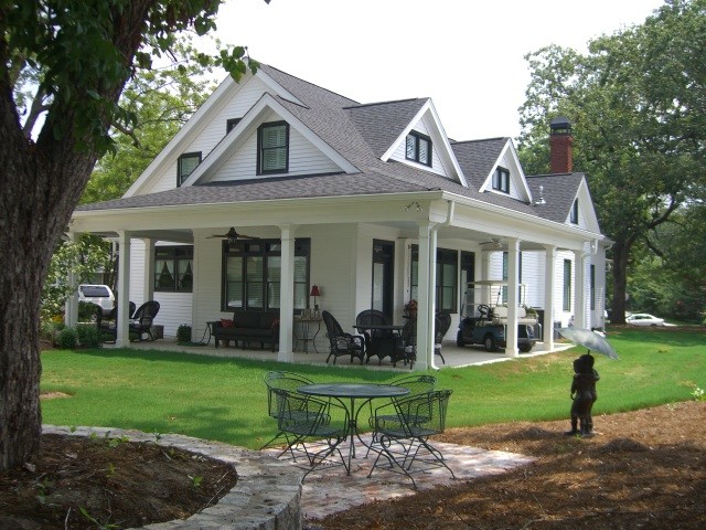 Example of a country white two-story wood exterior home design in Atlanta