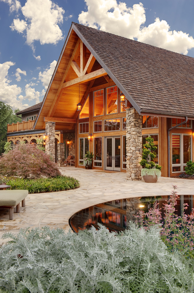 Inspiration for a large rustic exterior home remodel in Atlanta