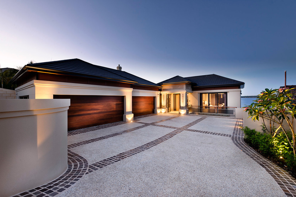 Beige contemporary bungalow house exterior in Perth with a hip roof.