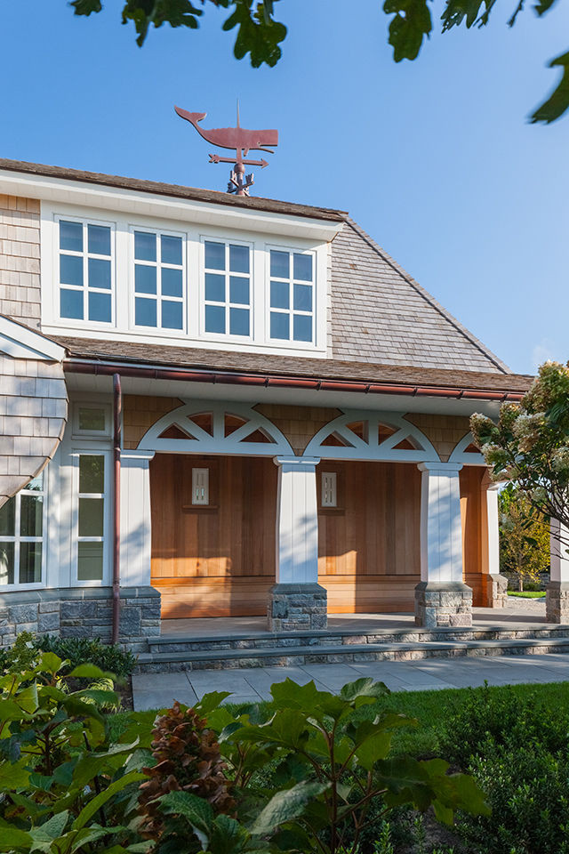 Inspiration for a coastal wood exterior home remodel in Boston