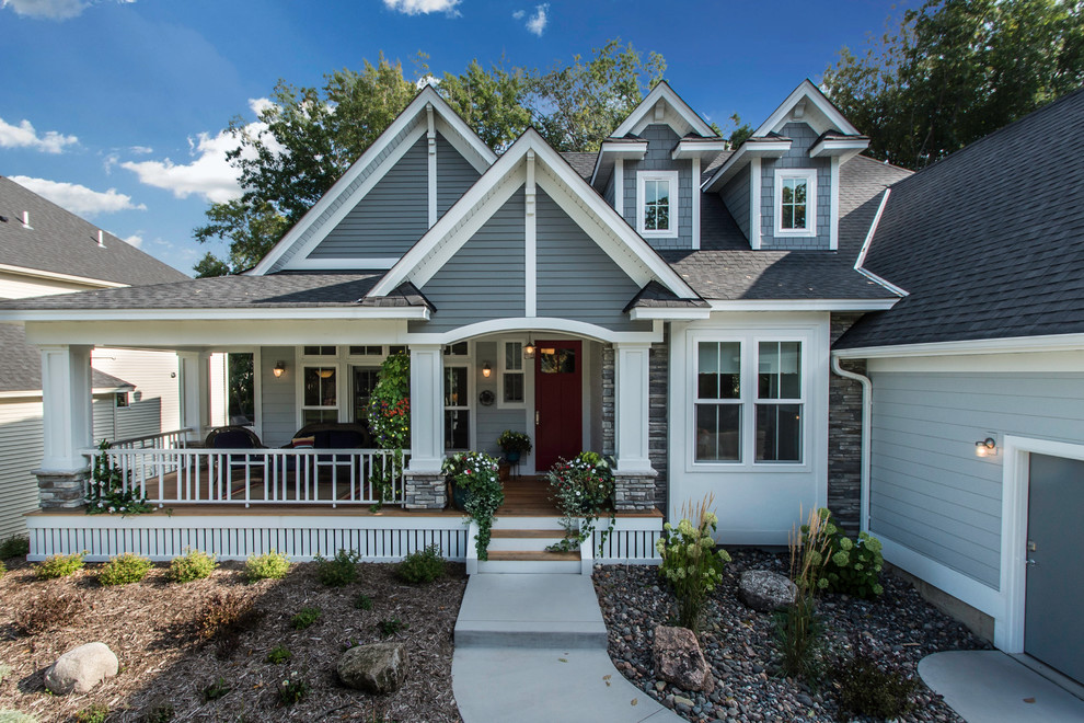 Inspiration for a mid-sized craftsman blue one-story mixed siding gable roof remodel in Minneapolis