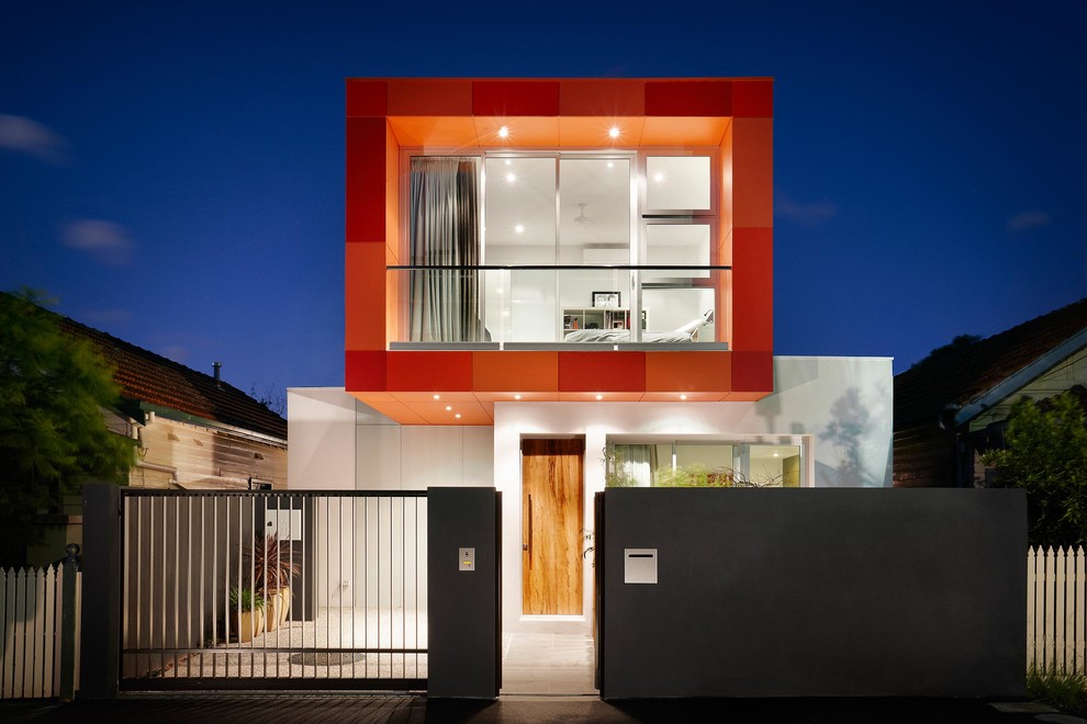 Идея дизайна: двухэтажный дом среднего размера в современном стиле с плоской крышей