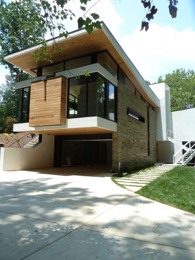 Design ideas for a modern house exterior in Atlanta.