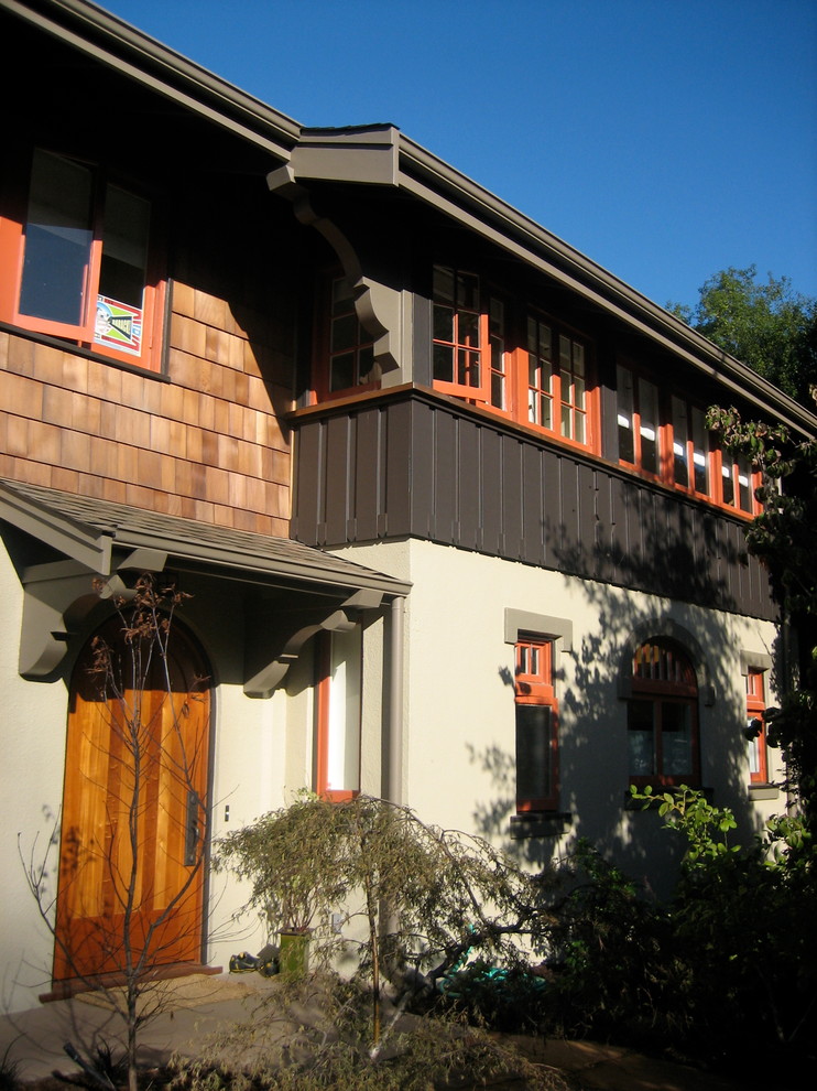 Large and brown classic two floor house exterior in San Francisco with mixed cladding.
