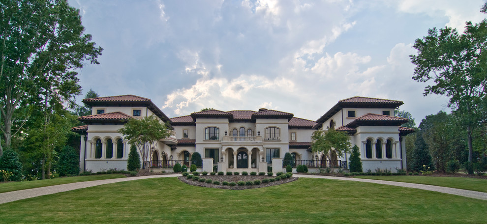 Example of a tuscan exterior home design in Charlotte