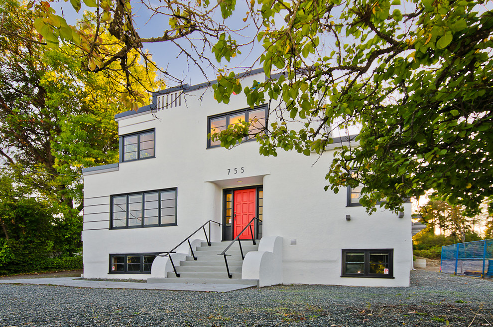 Zweistöckiges Modernes Haus mit Putzfassade, Flachdach und grauer Fassadenfarbe in Vancouver