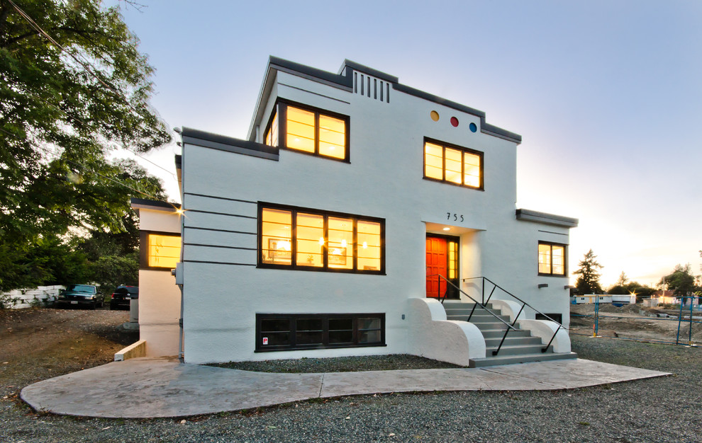 Источник вдохновения для домашнего уюта: большой, двухэтажный, серый дом в стиле модернизм с облицовкой из цементной штукатурки и плоской крышей