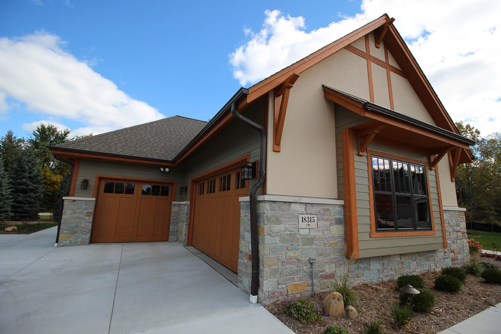Arts and Crafts home with Stucco exterior Craftsman Exterior