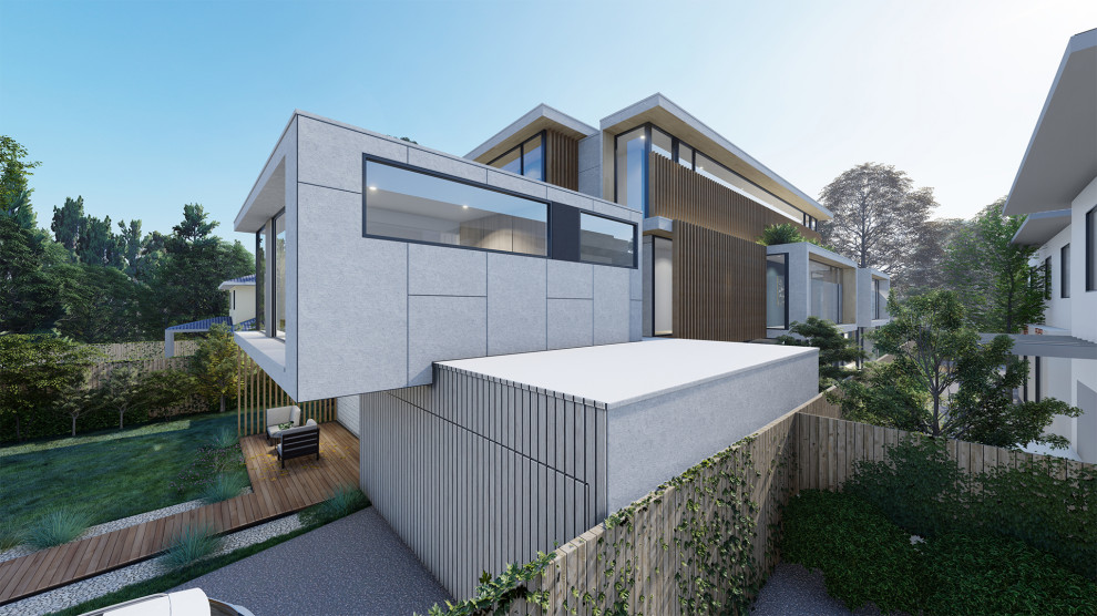 Mittelgroßes, Dreistöckiges Modernes Wohnung mit Betonfassade, grauer Fassadenfarbe und Blechdach in Melbourne